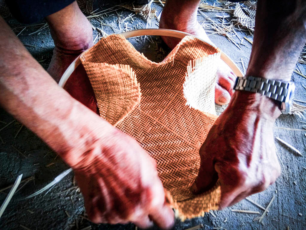 Photograph the collaborative spirit of Hue’s basket making